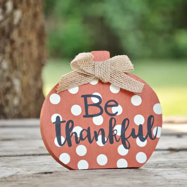 autumn pumpkin with a reminder to be grateful